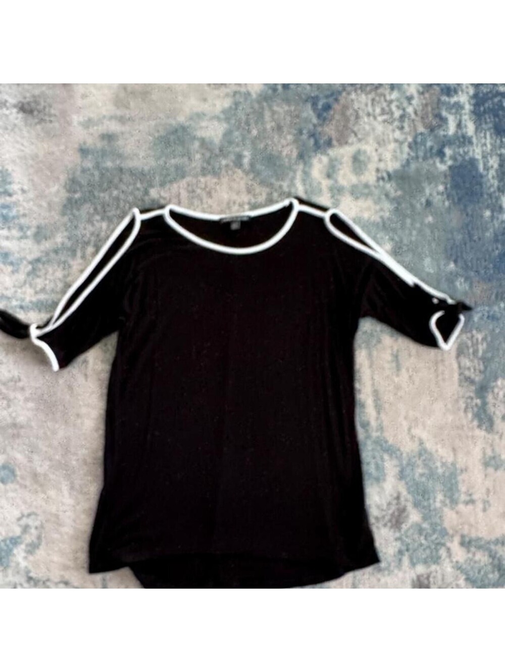Cable-gauge Women's Black Blouse with white trim, shoulders cut out